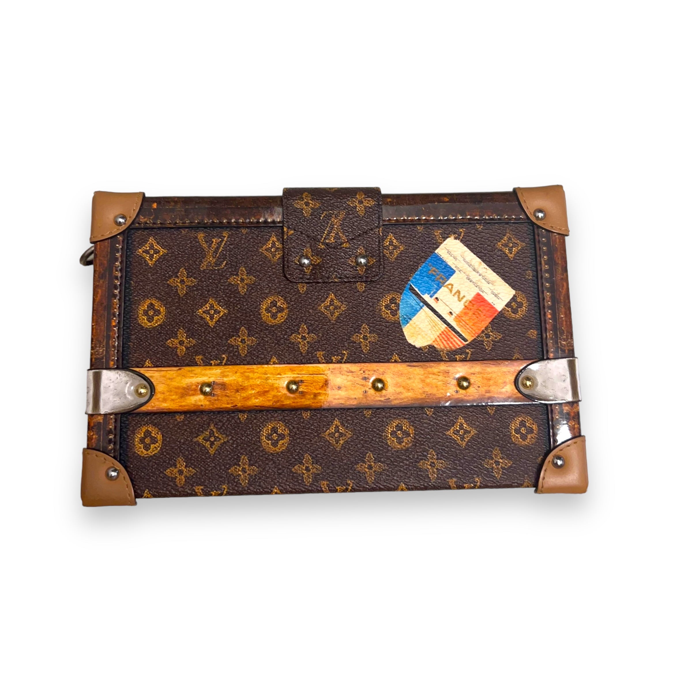 LOUIS VUITTON TRANSFORMED MONOGRAM PETITE MALLE