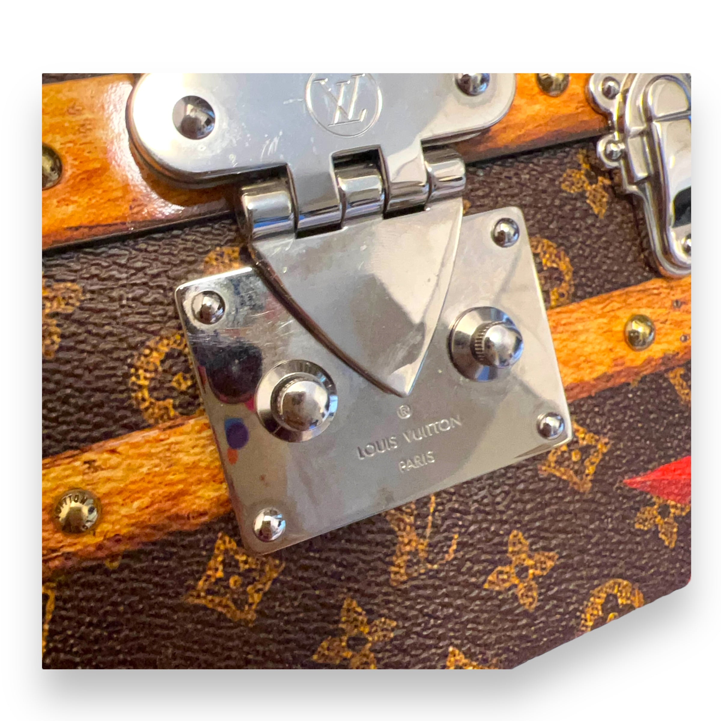 LOUIS VUITTON TRANSFORMED MONOGRAM PETITE MALLE